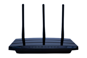 Close-up view of a modern wireless modem, displaying indicator lights and ports, against a neutral background.